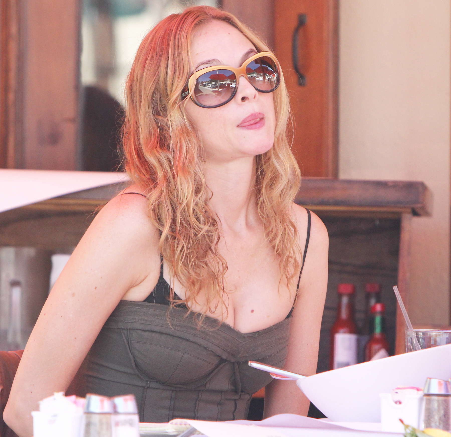 Heather Graham showing cleavage at a restaurant in Los Angeles